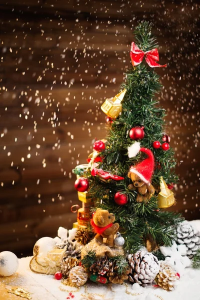 Christmas still life with teddy bears decorating tree — Stock Photo, Image