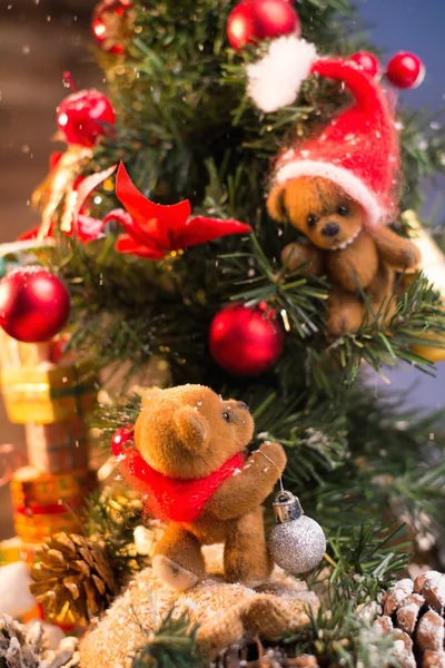 Christmas still life with teddy bears decorating tree — Stock Photo, Image