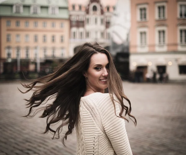 Beautiful girl in old european town — Stock Photo, Image