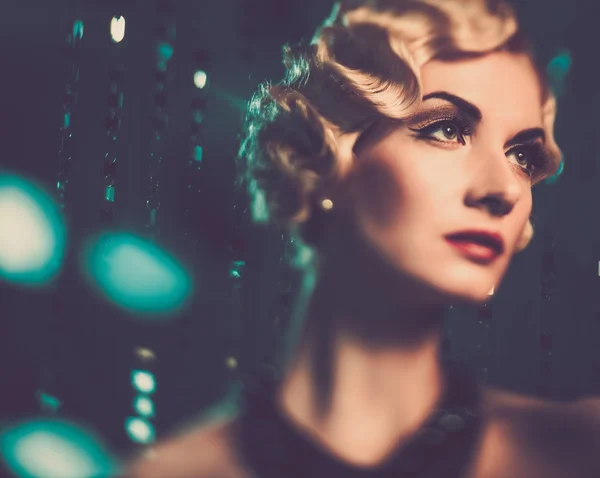 Elegant blond retro woman with beautiful hairdo — Stock Photo, Image