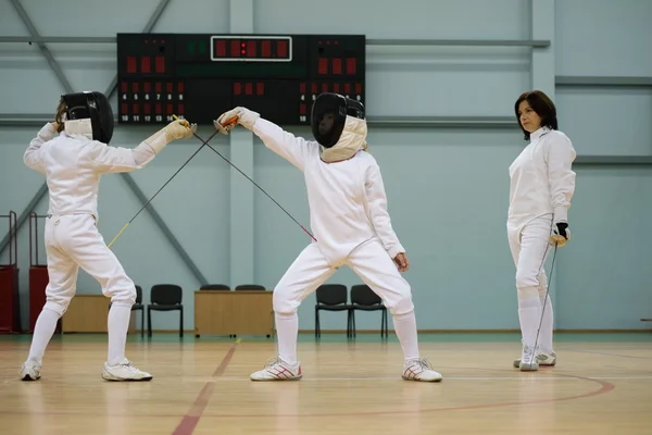 Children fencers and their  trainer — Stock Photo, Image