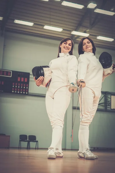Young woman fencer and her trainer — Stock Photo, Image