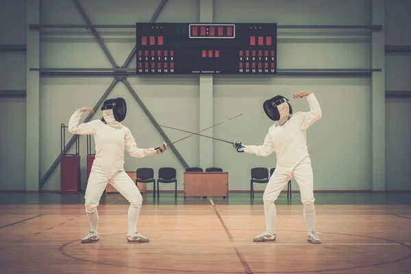 Two women fencers on a training — Stock Photo, Image