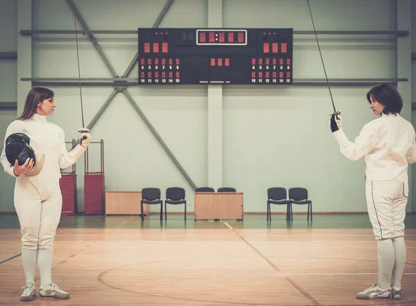 Young woman fencer and her trainer — Stock Photo, Image