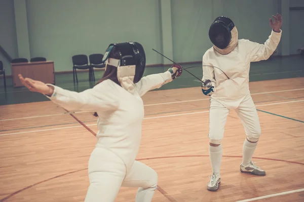 Two women fencers on a training — Stock Photo, Image