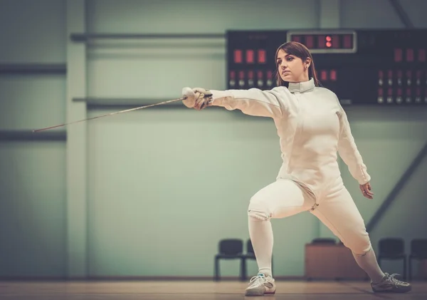 Young woman fencer with epee — Stock Photo, Image