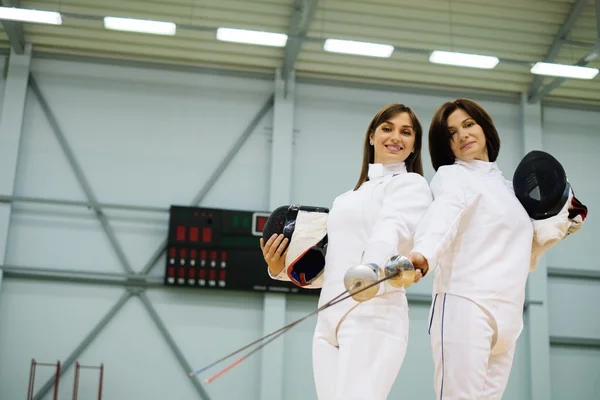 Young woman fencer and her trainer — Stock Photo, Image