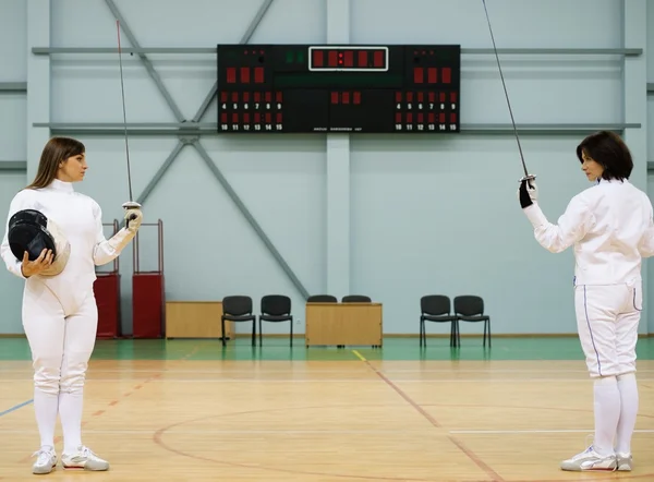 Young woman fencer and her trainer — Stock Photo, Image