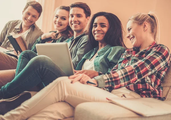 Multi ethnic young students preparing for exams — Stock Photo, Image