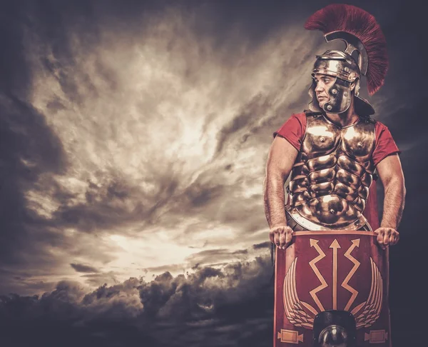 Legionary soldier and stormy sky — Stock Photo, Image