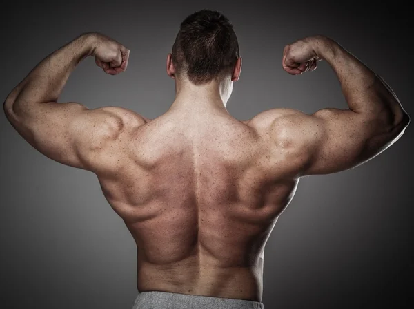 Man with muscular torso posing — Stock Photo, Image