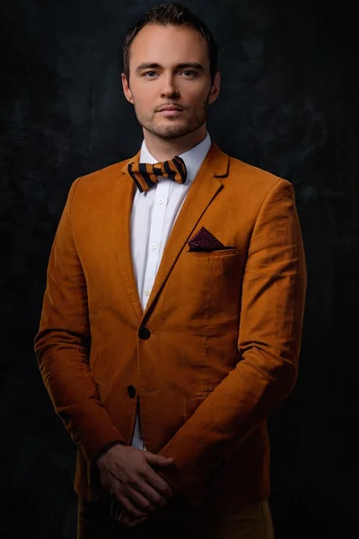 Sharp dressed fashionist wearing jacket and bow tie — Stock Photo, Image