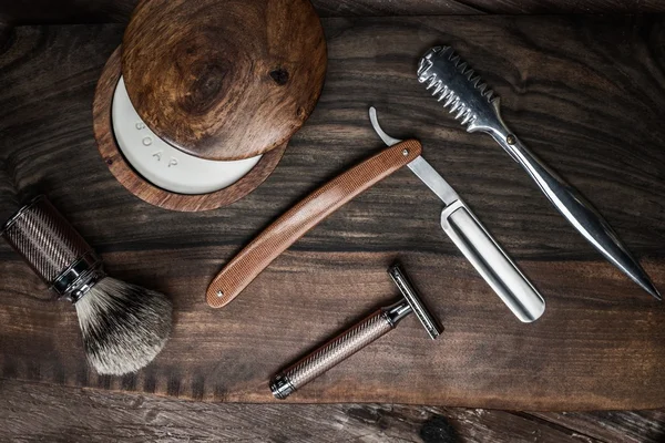 Shaving accessories on a luxury wooden background — Stock Photo, Image