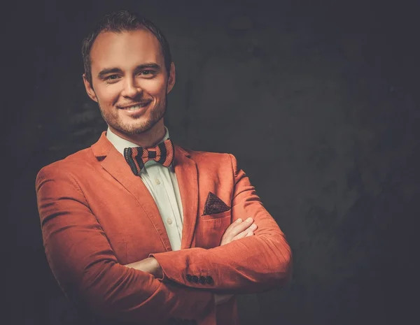Sharp dressed fashionist wearing jacket and bow tie — Stock Photo, Image