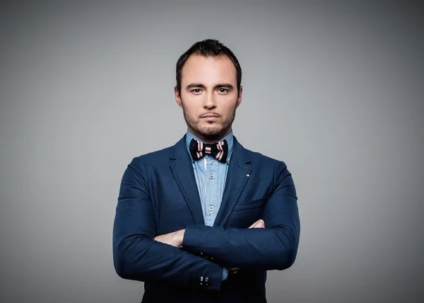 Sharp dressed fashionist wearing jacket and bow tie — Stock Photo, Image