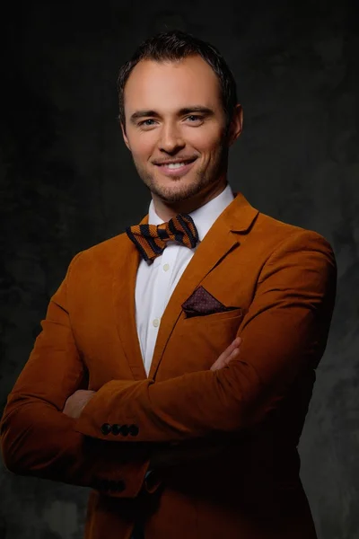 Sharp dressed fashionist wearing jacket and bow tie — Stock Photo, Image