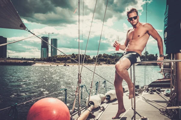 Handsome man on a regatta — Stock Photo, Image