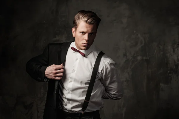 Tough sharp dressed man in black suit — Stock Photo, Image