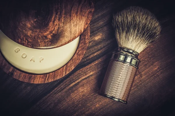 Shaving brush and soap on a luxury wooden background — Stock Photo, Image