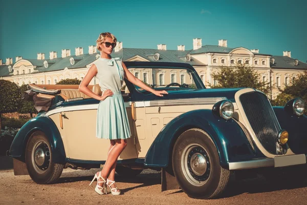 Beautiful lady near classic convertible — Stock Photo, Image