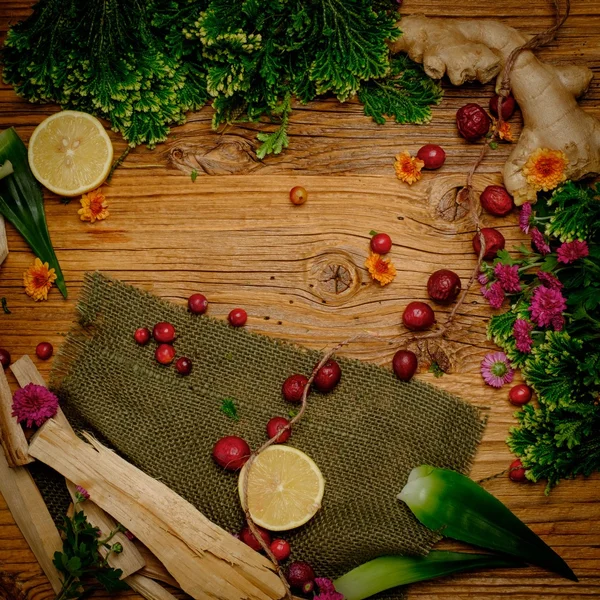 Autumn mood on wooden background