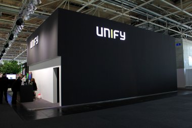 HANNOVER, GERMANY - MARCH 20: The stand of Unify on March 20, 2015 at CEBIT computer expo, Hannover, Germany. CeBIT is the world's largest computer expo clipart