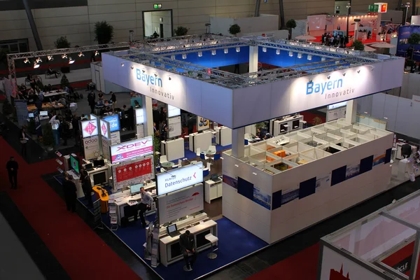 HANNOVER, GERMANY - MARCH 20: The stand of Bayern on March 20, 2015 at CEBIT computer expo, Hannover, Germany. CeBIT is the world's largest computer expo — Stock Photo, Image