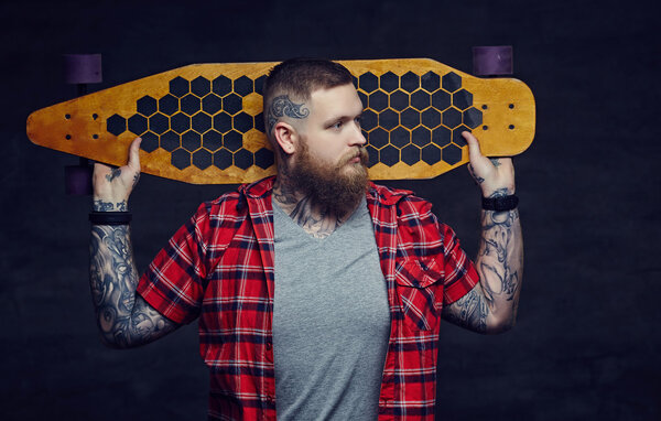 Bearded man with tattoos