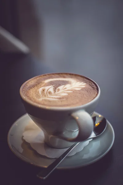 Kopje koffie met lepel — Stockfoto