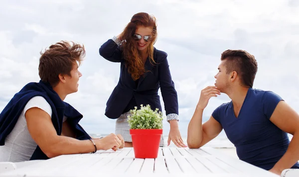 Two men and redhead woman. — Stock Photo, Image