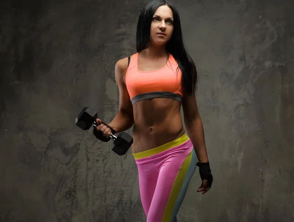 Sexy fitness woman with black hair — Stock Photo, Image