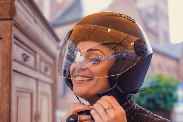 A woman in a moto helmet — Stock Photo, Image