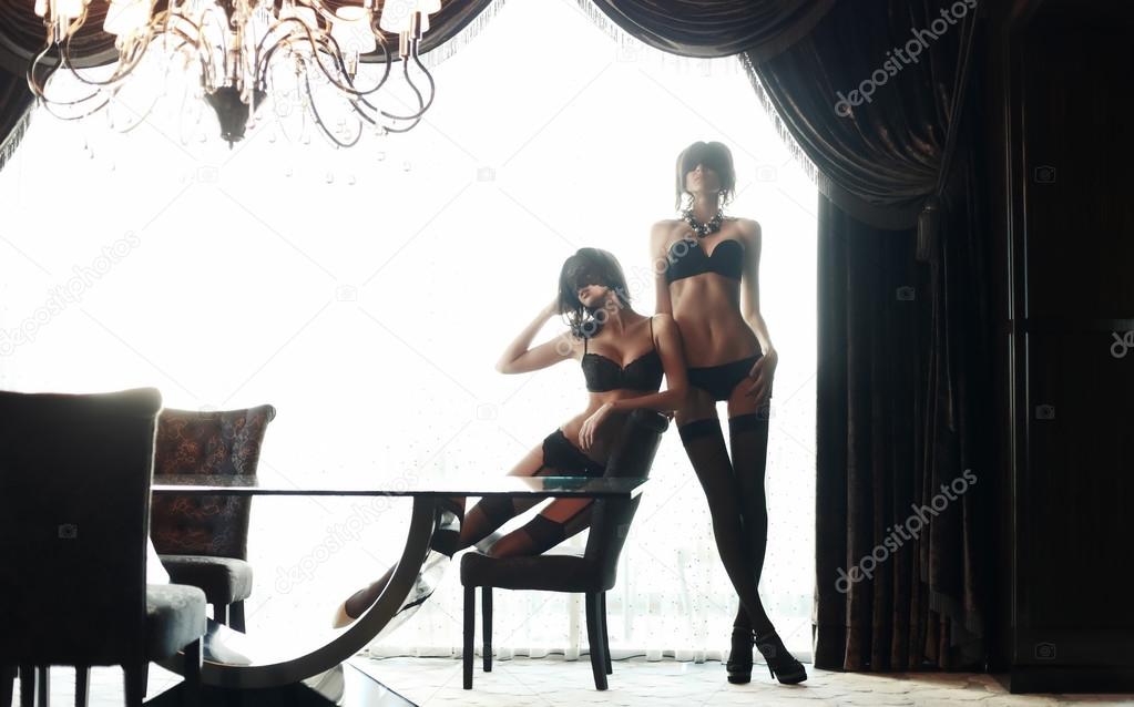Two sexy girls in underwear posing