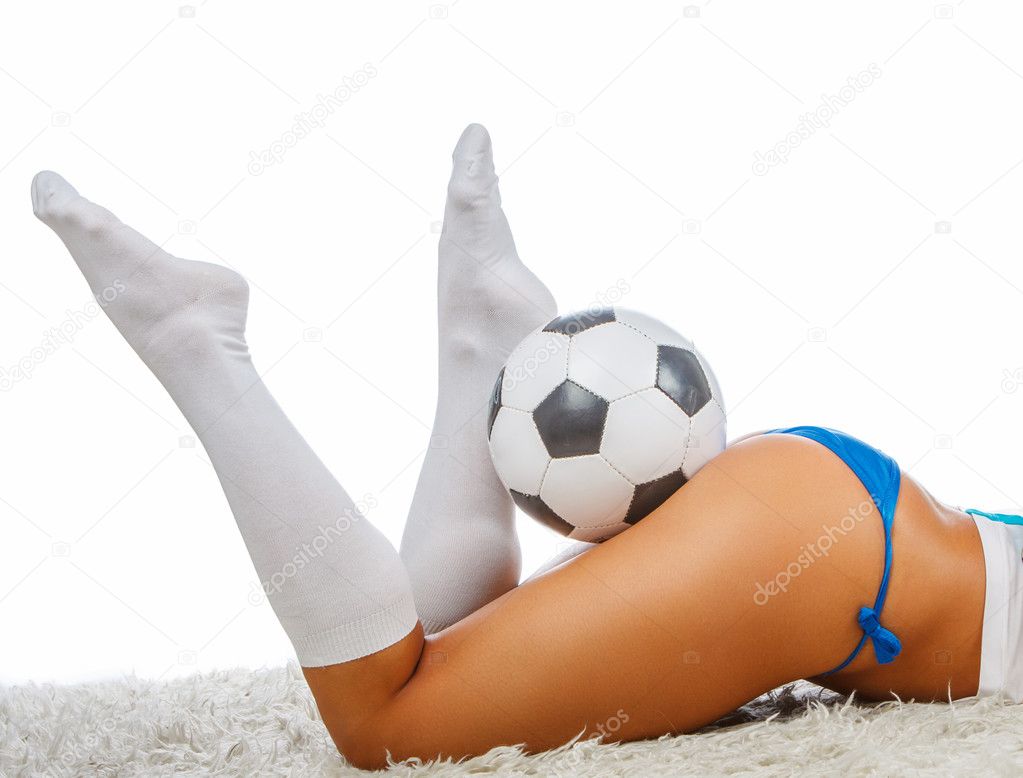 Woman's legs and ball.