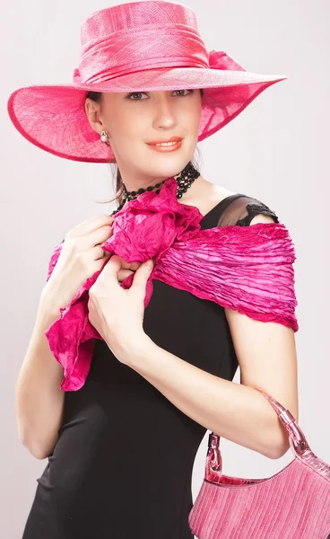 Woman in a pink summer hat — Stock Photo, Image