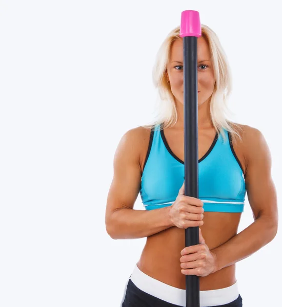 Athletic blond woman doing exercises. — Stock Photo, Image