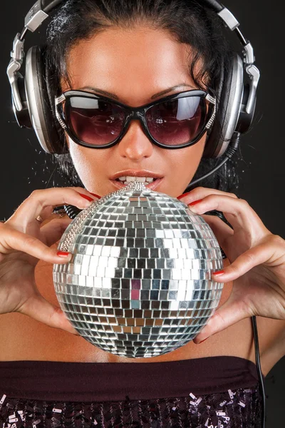 Woman holds mirror disco ball — Stock Photo, Image