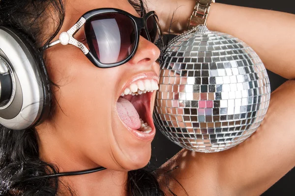 Woman holds mirror disco ball — Stock Photo, Image