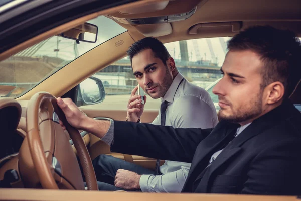Two modern guys in the car — Stock Photo, Image