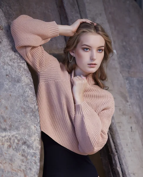 Woman in a vintage creme sweater — Stock Photo, Image