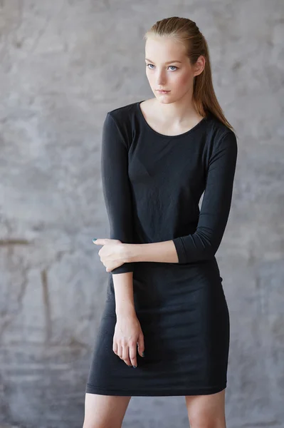 Girl in black classic dress — Stock Photo, Image