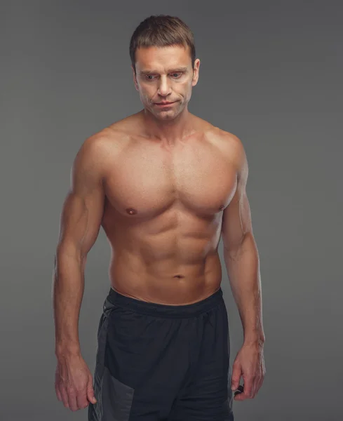 Middle age shirtless muscular man — Stock Photo, Image