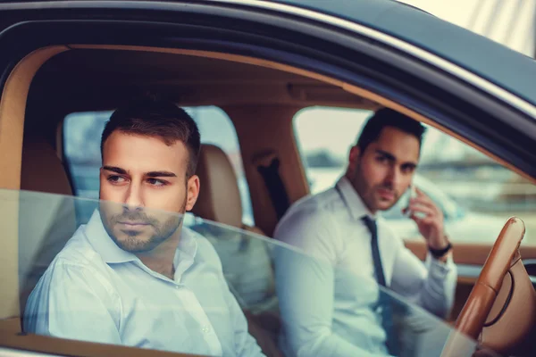 Two modern guys in the car — Stock Photo, Image