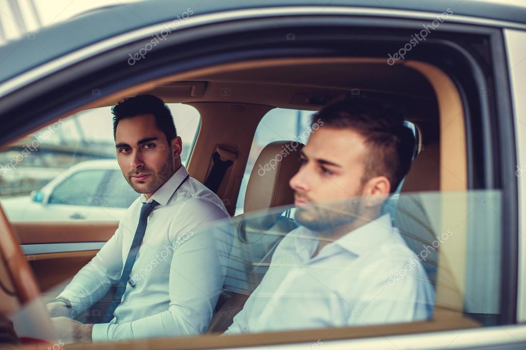 Two modern guys in the car Stock Photo fxquadro 105991198