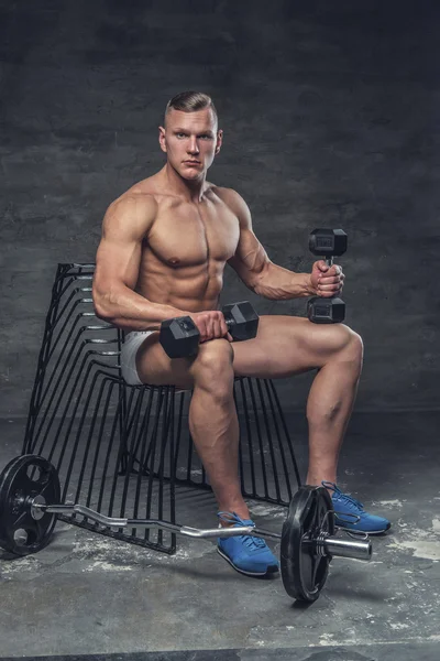 Sexy muscular guy in a white panties — Stock Photo, Image