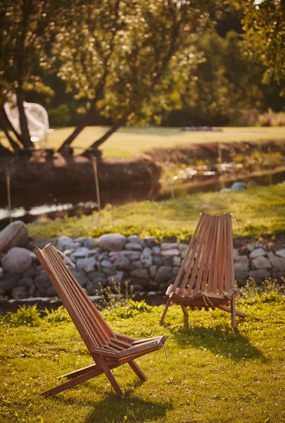 Two wooden chaise lounges — Stock Photo, Image