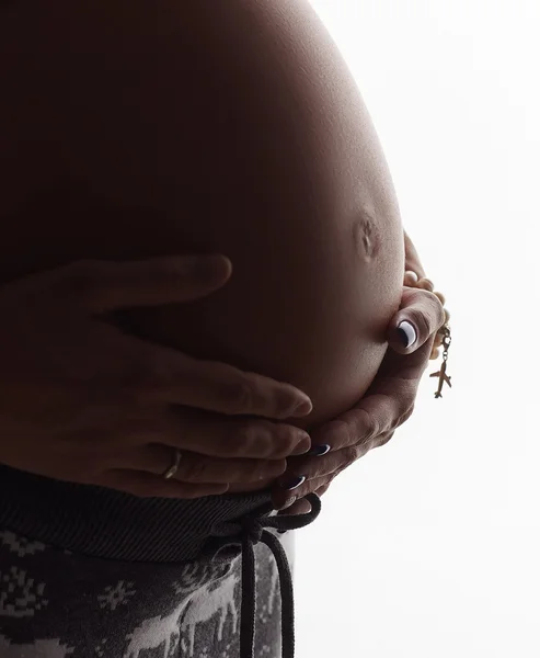 Pregnant female's stomach — Stock Photo, Image