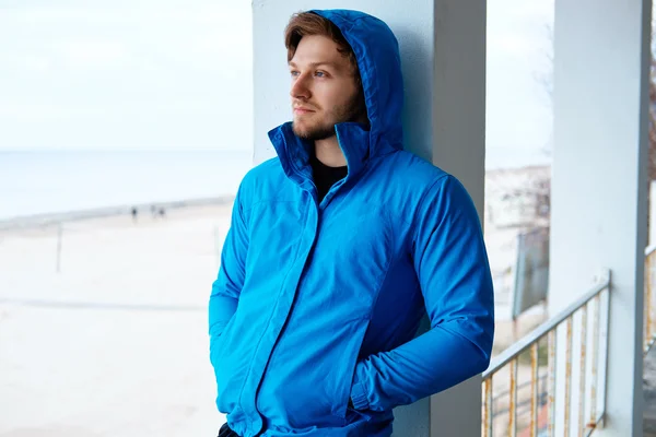 Freezed man in blue hoodie. — Stock Photo, Image