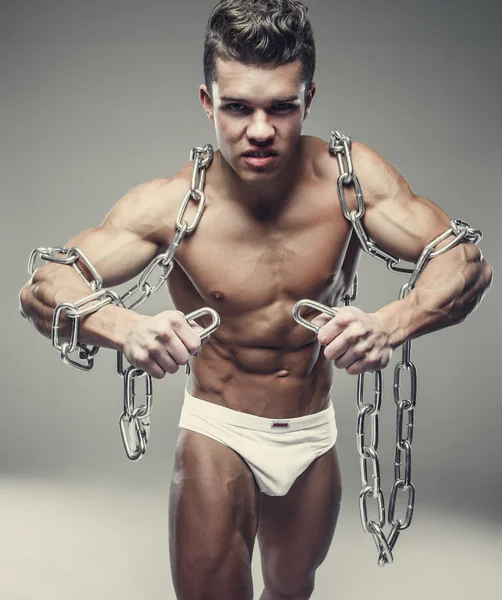 Muskulös manlig modell i vita trosor — Stockfoto