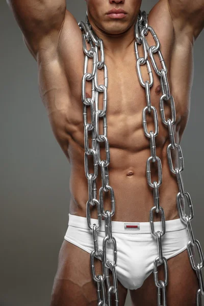 Muskulöses männliches Modell in weißen Höschen — Stockfoto